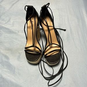 Just Fab size 6 black wedges. Never worn.